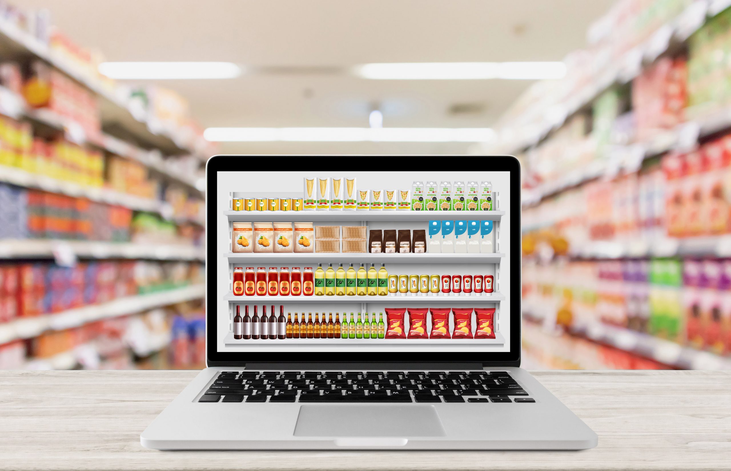 laptop computer on wood table with supermarket shelf test interactive